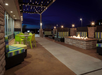 Outdoor lounge with a firepit.