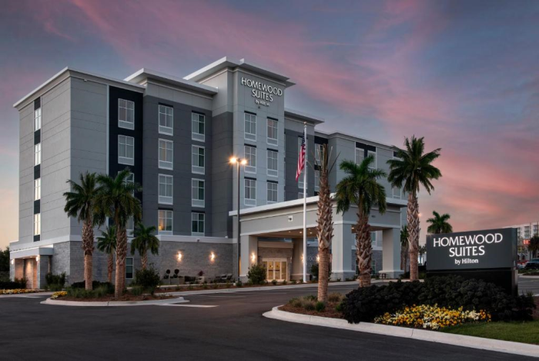 Homewood Suites By Hilton Destin - exterior view at night.