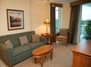 Living area and a private balcony with views.