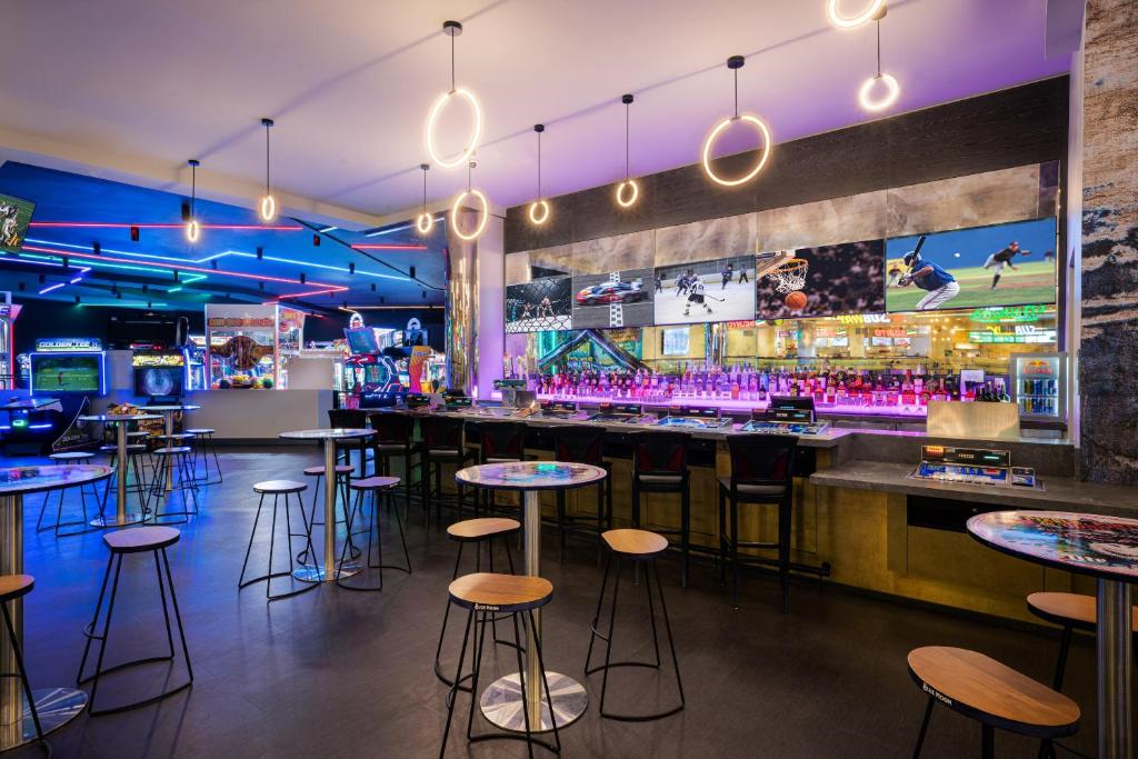 Well-lit on-site bar with seating area.