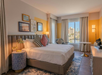 Room with a king bed and a view of San Sebastian River
