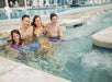 A family enjoying the whirlpool.