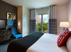 One king bed inside a guest room.
