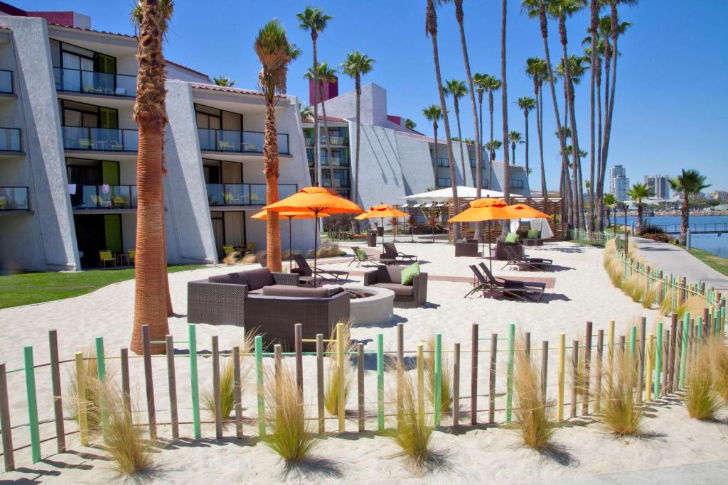 Relax on sun loungers with a peaceful bay view.