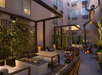 Outdoor seating area with fire pit.