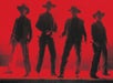 Four people in cowboy hats and western attire stand side by side, silhouetted against a bright red background.