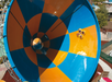 Ride the Tornado's thrilling funnel.