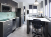 Kitchen, microwave, refrigerator, stovetop, oven at Hyatt House Jersey City, NJ.