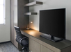 Work desk, flat-screen TV at Hyatt House Jersey City, NJ.