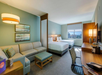 2 Queen beds and a living area at Hyatt Place Boca Raton/Downtown. 