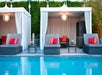 Outdoor pool cabanas.