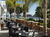 Al fresco dining overlooking Mother's Beach and the Marina.