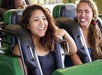 Teenage girls buckled into the Anaconda roller coaster ready for the ride at Kings Dominion in Doswell, Virginia.