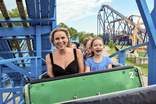 Family-friendly fun on the classic Woodstock Express wooden coaster at Kings Dominion.
