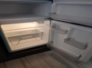 Mini fridge with a small freezer.