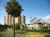 Property exterior with lush greenery.
