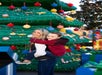 A mom and son if front of a Lego Christmas tree at LEGOLAND Florida Resort.