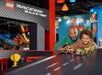 A father and son playing with LEGO cars at LEGOLAND® Discovery Center in Columbus, Ohio