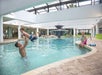 Indoor heated pool with a water fountain