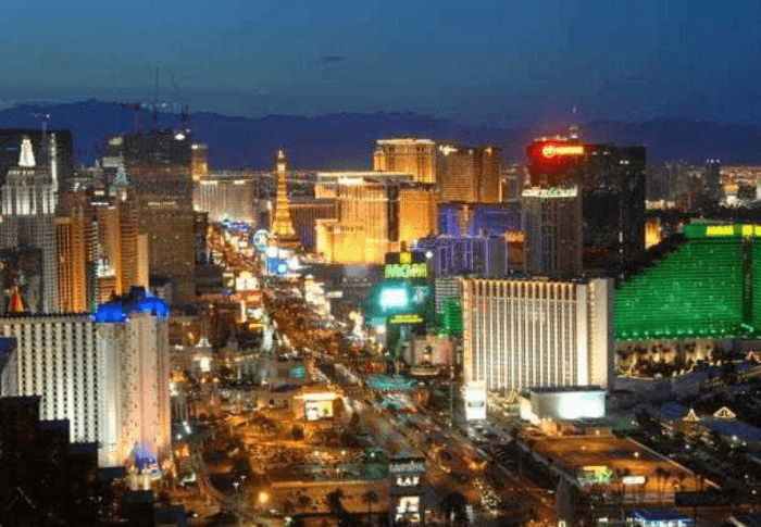 Aerial view looking down on the Las Vegas Marriott and Las Vegas strip at night.