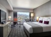 Stay productive and relaxed with one king bed, a plush sofa, a work desk, and a TV in your room.