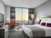 Unwind in a room with one king bed, a work desk, and a flat-screen TV for the ultimate comfort.
