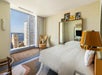 One king bed and a seating area in a guest room.