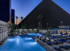 Seasonal outdoor pool with sun loungers.