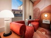 Seating area inside a guest room.