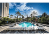 Refreshing outdoor pool with sun loungers.
