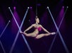 Hair suspension aerial act at Mad Apple Cirque Du Soleil show in Las Vegas, Nevada.