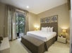 Master Bedroom with a king bed.