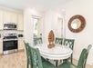 Dining area and a full kitchen.