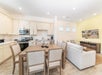 Spacious living and dining areas, and a fully-equipped kitchen.