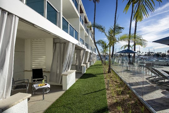 First floor rooms with patio and walk way.