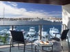 Room with a balcony overlooking the marina.