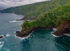 Tendril-like mountain peninsulas coming off the coast of Maui into the ocean seen from the air on the Maui Spectacular Helicopter Tour in Hawaii USA.