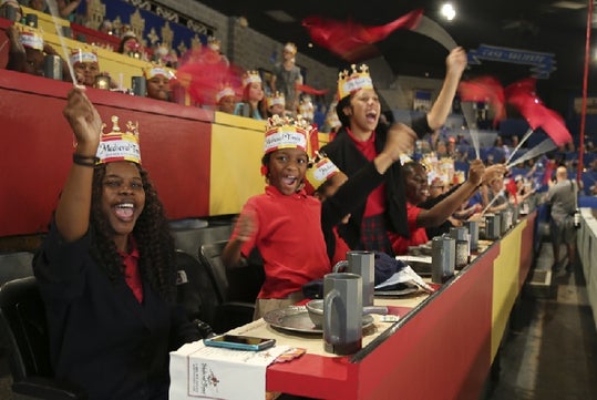 Guests cheer at the dinner tournament