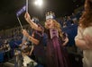 A child is dressed up like a princess