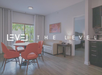 Modern hotel suite with a round dining table, four orange chairs, a beige sofa, and a view into a bedroom; text reads "LEVEL | THE LEVEL.