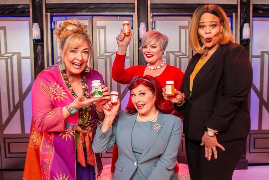 Four women smiling and holding various prescription pill bottles against an art deco-style background.