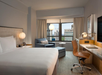 1 King bed, sofa chair, work desk, flat-screen TV at New York Hilton Midtown, NY.