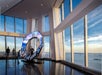 Three visitors at One World Observatory with New York Pass by Go City in NYC, New York, USA.