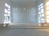 A shrine with names of the USS Arizona 1,177 soldiers who fought during the war in 1941 with abstract windows on both sides.