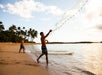 Net Throwing - Paradise Cove Luau in Kapolei, Hawaii
