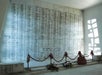 USS Arizona Memorial Wall with flowers - Pearl Harbor City Tour in Honolulu, Hawaii