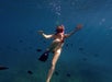 Snorkeling in the ocean in Waikiki, Hawaii