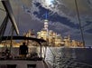 The New York skline at night on the Private Sailboat Charter to the Statue of Liberty and NYC.