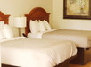 Guest room with two queen beds.