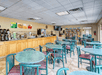 Assorted coffee, cereals, and pastries available at the breakfast buffet. 